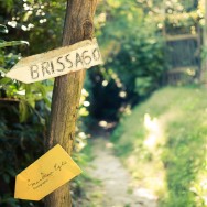 A signpost showing the direction to Brissago, a village in the Italian part of Switzerland.