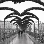 Walkers on a bridge in Luzern, Switzerland.