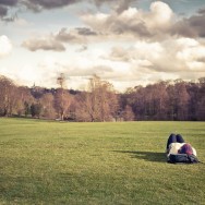 A women sunbathing with no sun.