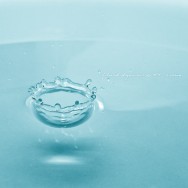 A close-up of a crown created by a drop of water.