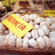 A basket of amaretti at a farmers market.