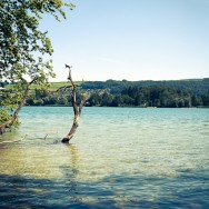 A turquoise coloured lake in Switzerland.
