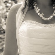 bridal details A detail of the bride's dress and her necklace in black and white.