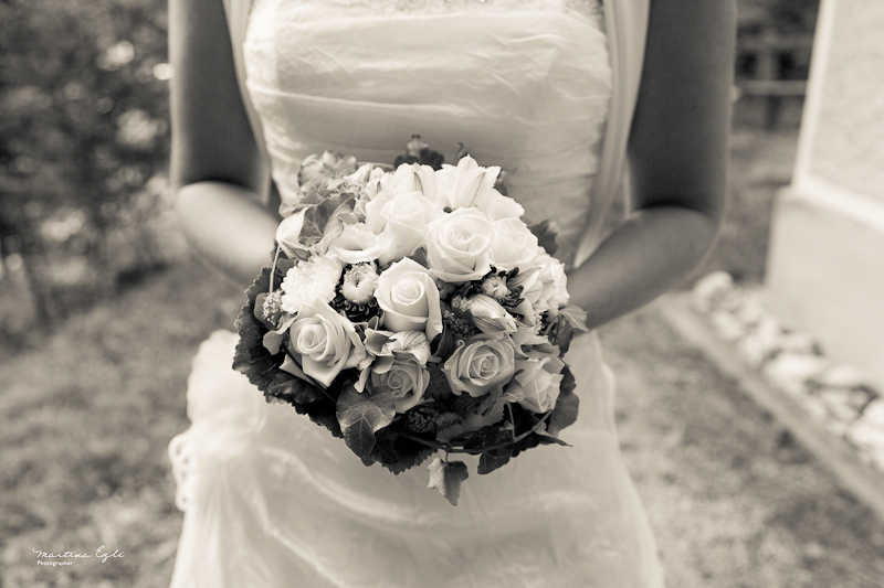bridal bouquet A wonderful bride is holding her beautiful bridal bouquet made from white roses.
