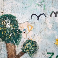 Children's drawings on a wall.