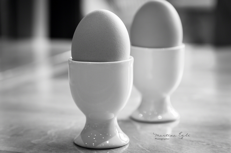 Boiled eggs in egg cups