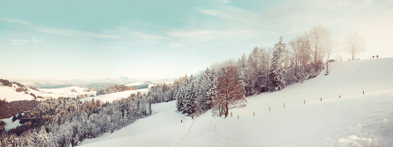 A view of a snowy landscape in Switzerland.
