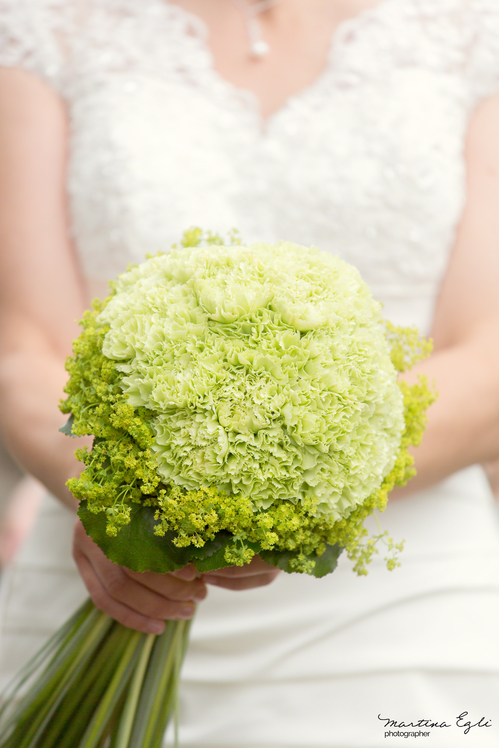 A Bride holds her bouquet