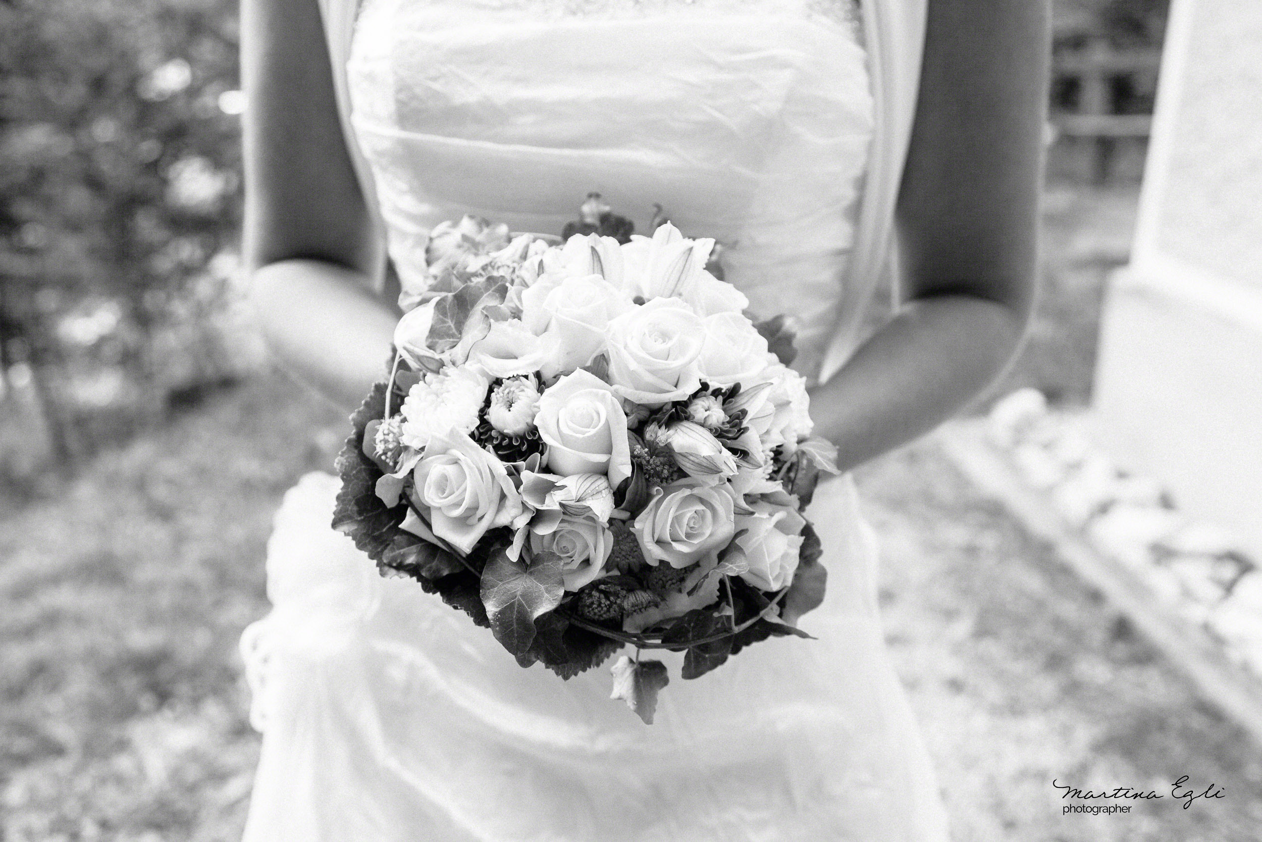 A Bride holds her bouqet