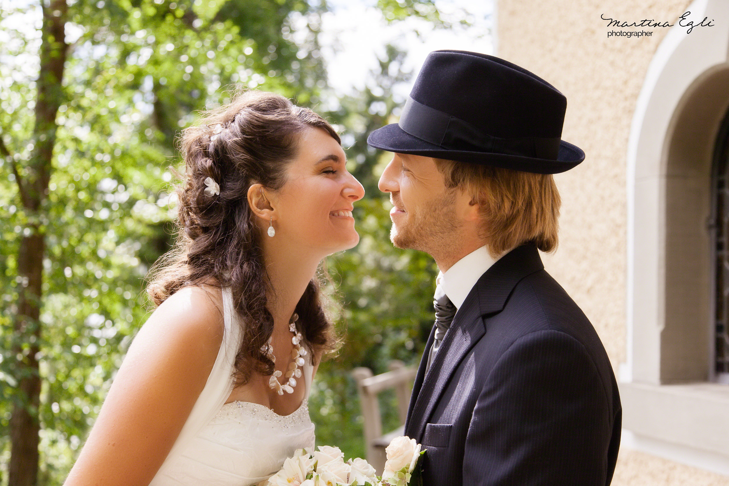 A Bride prepares to kiss her Groom