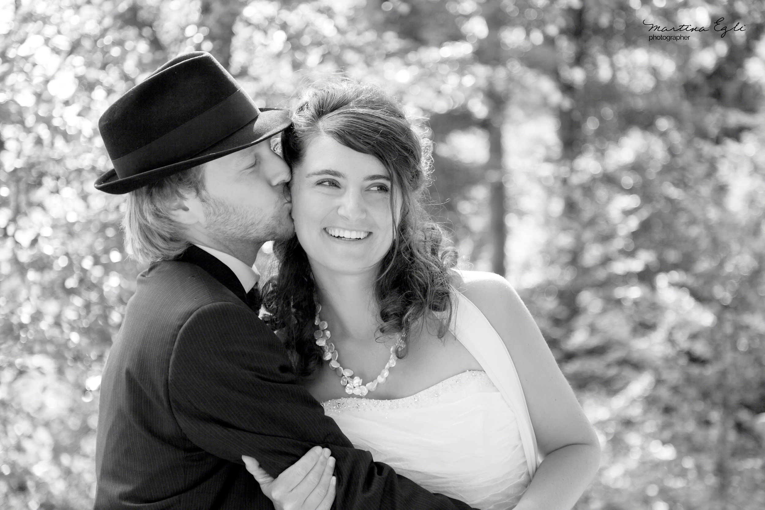 A Groom kisses his Bride