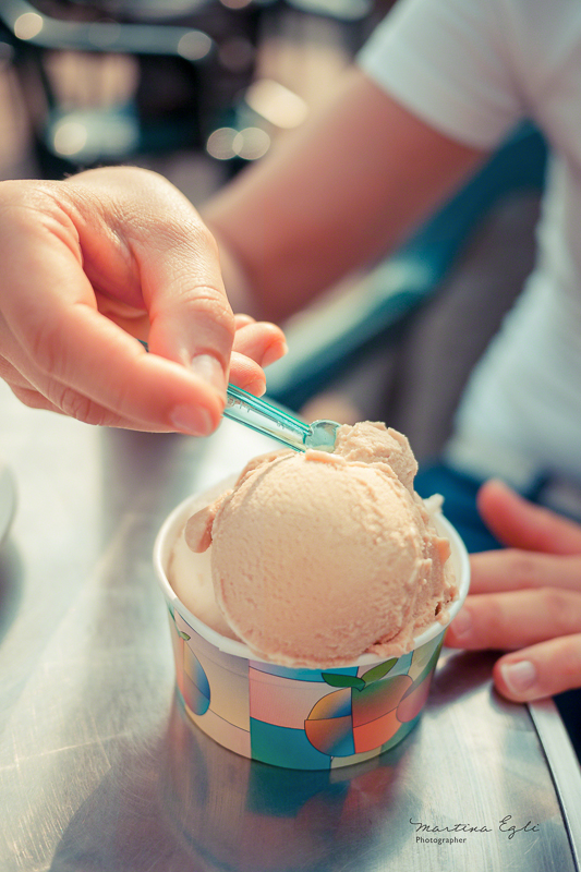 Digging into a tub of ice cream