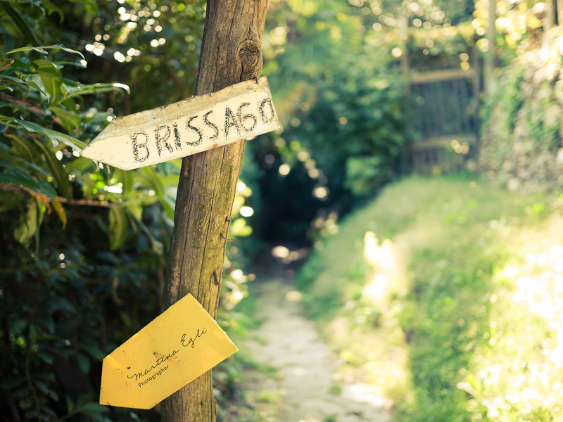 A signpost showing the direction to Brissago, a village in the Italian part of Switzerland.