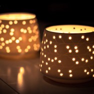 Candle holders illuminated from within.