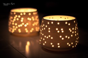 Candle holders illuminated from within.