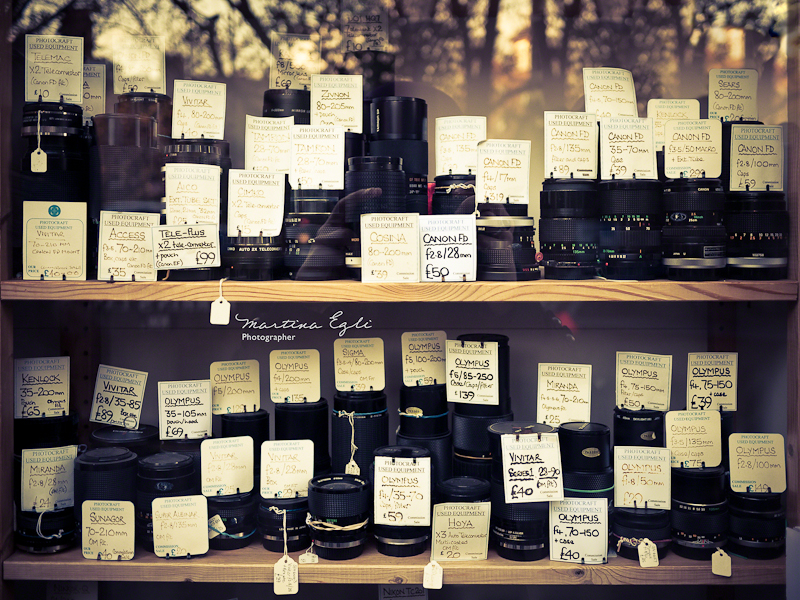 A window display of a camera shop.