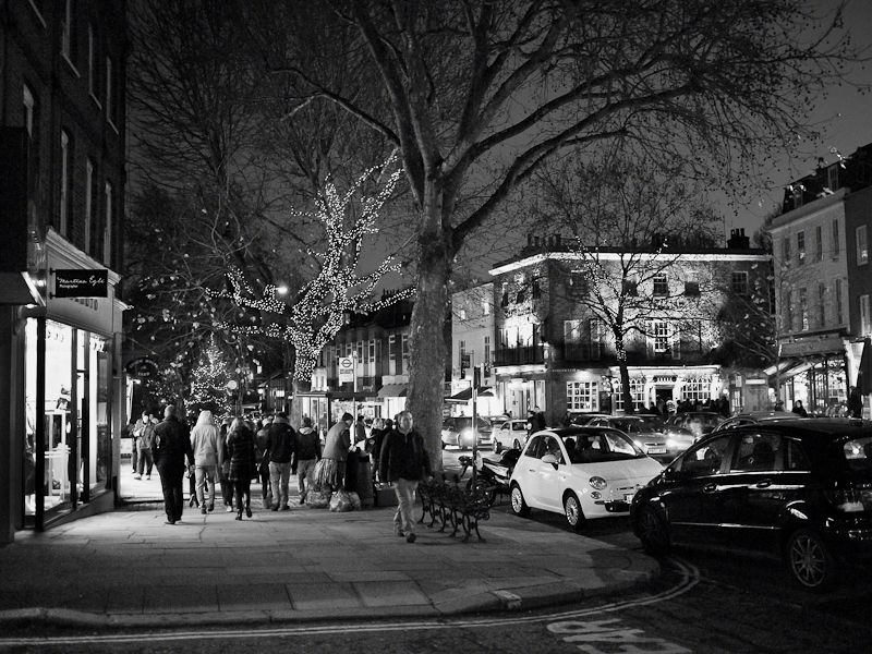 A street in Hampstead filled with Christmas shoppers.