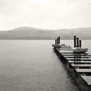 A jetty over Loch Lomond in storymy weather.