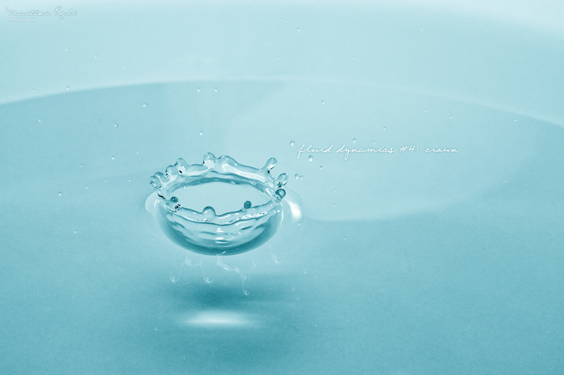 A close-up of a crown created by a drop of water.