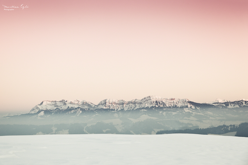 Pilatus and the Alps in winter at sunset.