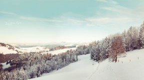 A view of a snowy landscape in Switzerland.